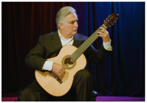 Francisco G. Cigarroa playing classical guitar