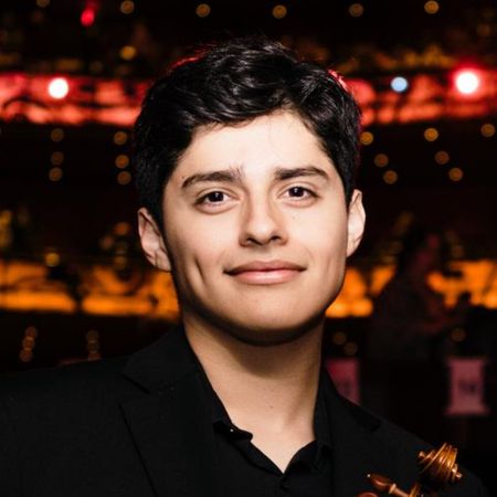 Kaitlyn Lien holding a violin